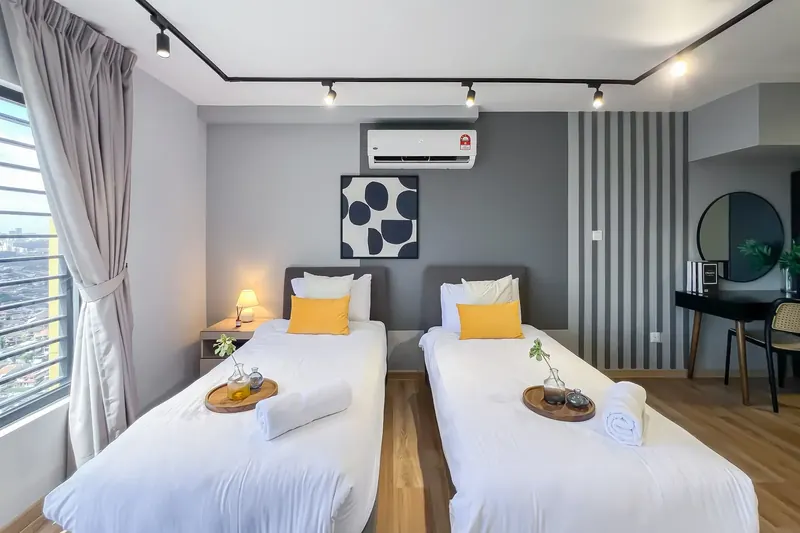 Twin beds on the mezzanine of an Arte Cheras unit