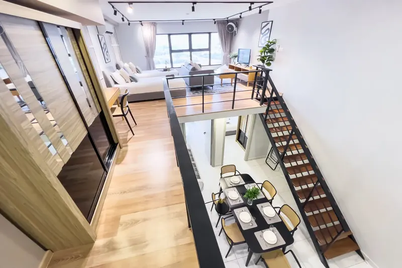 The double-height view in an Arte Cheras loft unit managed by WefieHome