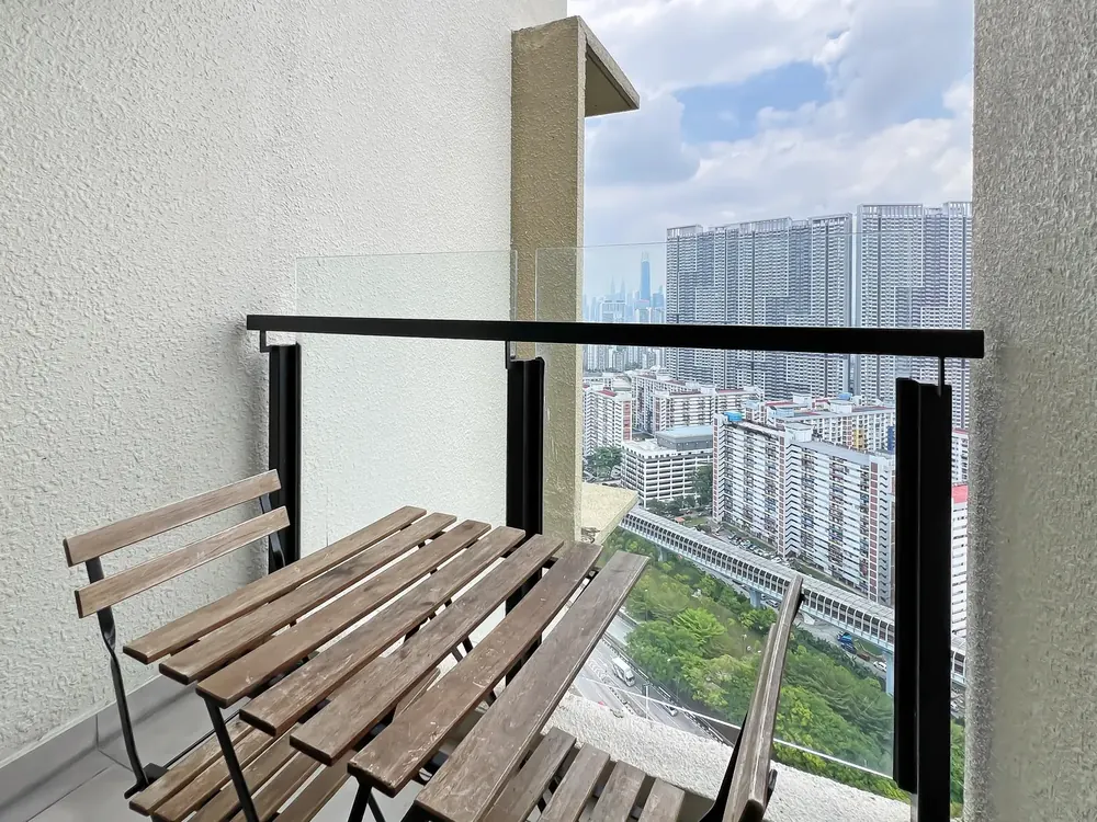 Balcony in 2024 with a small folding table and chairs