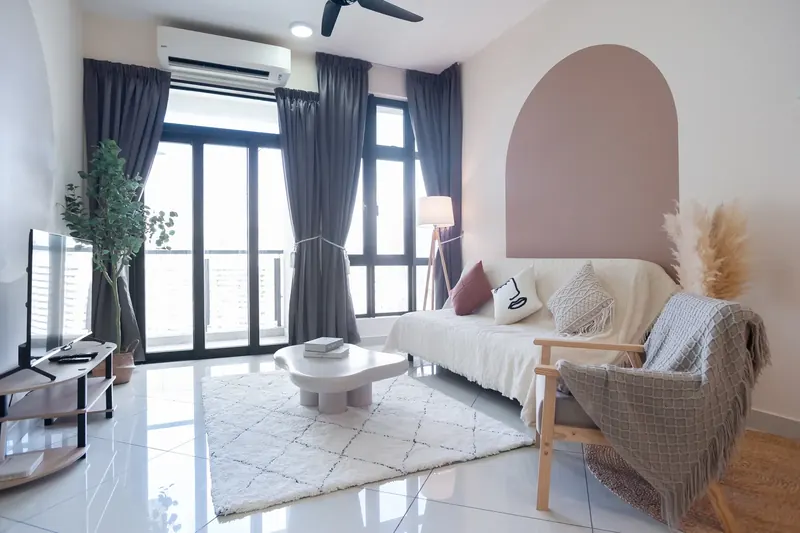 Soft pink and cream living room in a J Dupion Residence unit managed by WefieHome