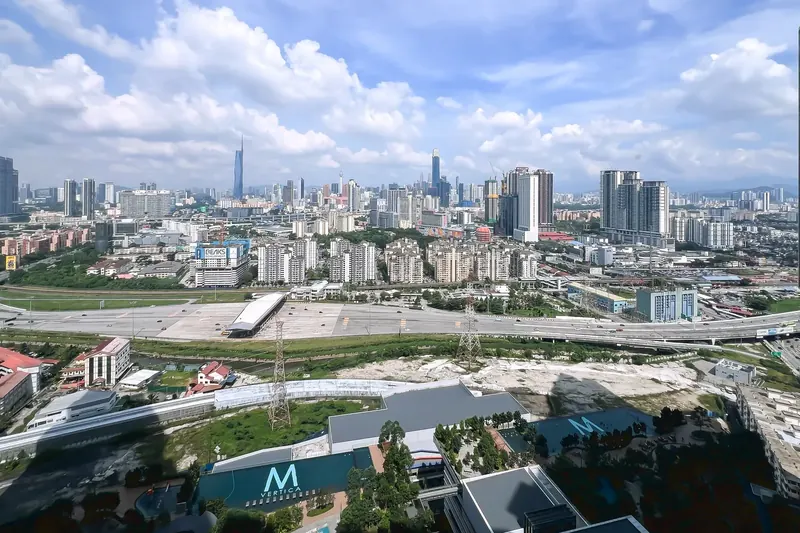 High-floor view over the M Vertica towers to the Kuala Lumpur skyline