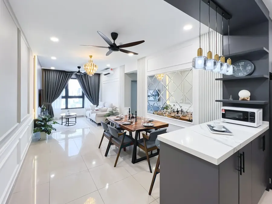 Renovated open-plan kitchen and dining area in a condo managed by WefieHome