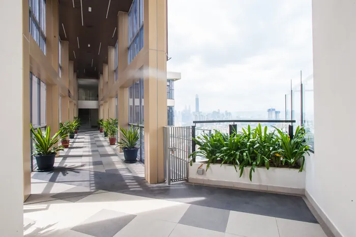 J Dupion Residence sky bridge corridor with city views
