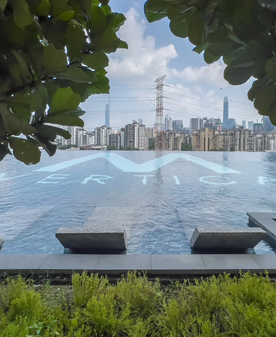M Vertica infinity pool with the M Vertica logo and the Kuala Lumpur skyline
