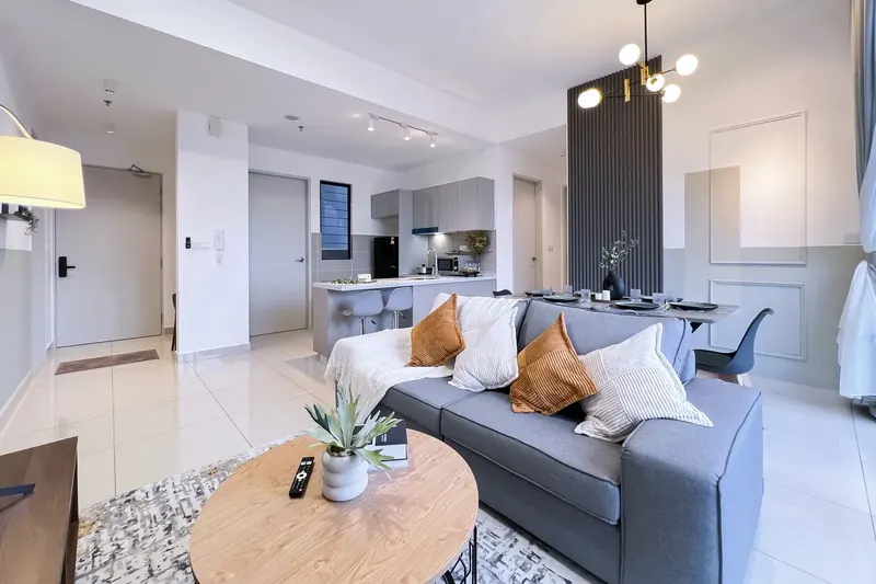 Living room and kitchen in the 3-bedroom Trion KL unit