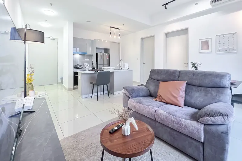 Living room and kitchen in the 2-bedroom Trion KL unit